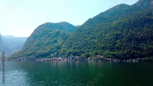Summer landscape with lake in Hallstatt by blue sky, Upper Austria. European alps and Hallstatter lake in Salzkammergut region, UNESCO world heritage