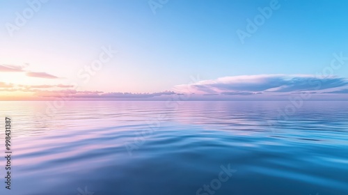 Visualize a serene evening scene with the sky transitioning from bright blue to soft purple, over a calm sea.