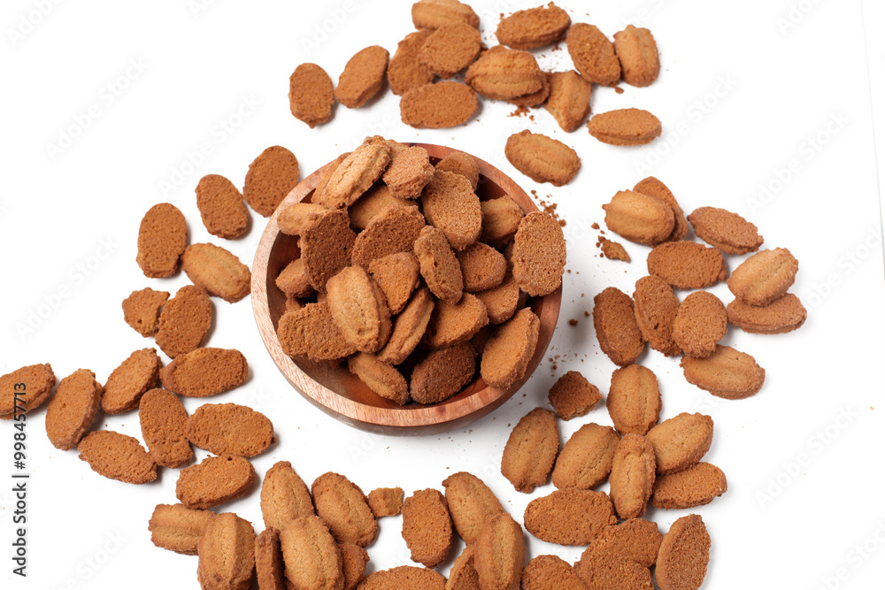 biscuits with coffee flavor, isolated on white background, on a wooden bowl, top view biscuits with coffee flavor, isolated on white background, on a wooden bowl, top view