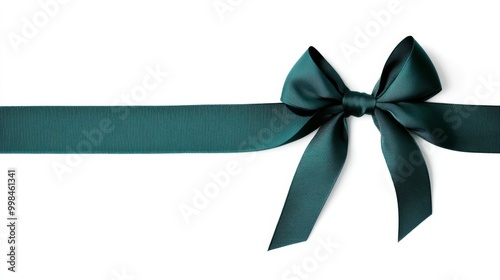 An isolated green ribbon with a green bow is rolled and positioned on a white background.