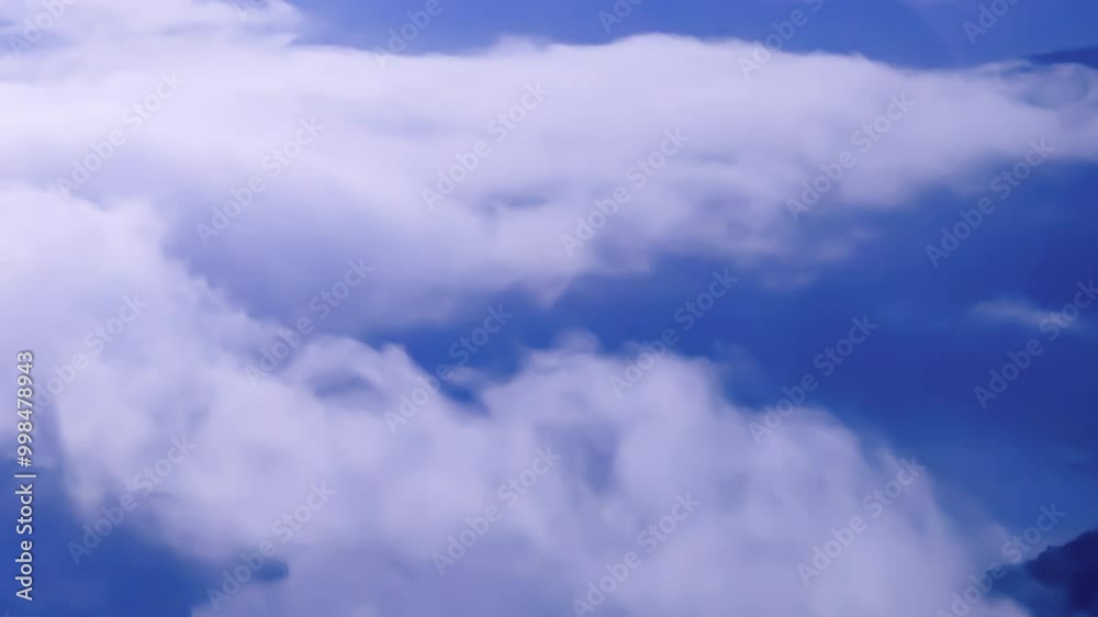A breathtaking panoramic view of a sea of clouds below a crescent moon and a starry night sky. The silhouette of distant mountains adds depth and drama to this serene landscape. Xindian, Taiwan. A breathtaking panoramic view of a sea of clouds below a crescent moon and a starry night sky. The silhouette of distant mountains adds depth and drama to this serene landscape. Xindian, Taiwan.