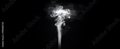 Small white smoke swirling effect on black background with misty and vaporous texture	 photo