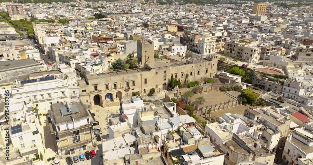 Aerial view of Episcopio Castle in the historic center of Grottaglie. It is a medieval castle of the city in the province of Taranto in Puglia, Italy. Aerial view of Episcopio Castle in the historic center of Grottaglie. It is a medieval castle of the city in the province of Taranto in Puglia, Italy.