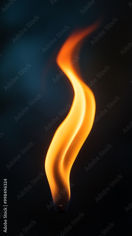 A captivating flame dances gracefully against a dark backdrop, showcasing its vibrant orange and yellow hues in stunning detail. A captivating flame dances gracefully against a dark backdrop, showcasing its vibrant orange and yellow hues in stunning detail.