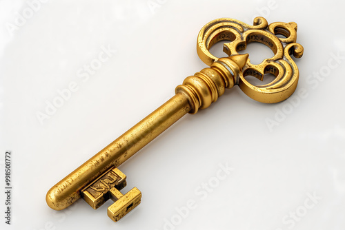 Vintage Ornate Golden Key Isolated on White Background photo