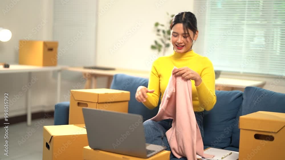 Young entrepreneur reviewing the quality of a pink sweater before shipping to a customer, ensuring satisfaction with the product in a cozy home office setting Young entrepreneur reviewing the quality of a pink sweater before shipping to a customer, ensuring satisfaction with the product in a cozy home office setting