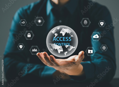 Businessman holding digital key icon and virtual access control icon for personal data security access. Automatic access control system. Access control concept. photo