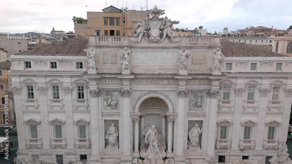 Tilt Down Aerial Shot Of The Trevi Fountain In Rome, Italy. Famous Roman Tourist Attraction. Tilt Down Aerial Shot Of The Trevi Fountain In Rome, Italy. Famous Roman Tourist Attraction.