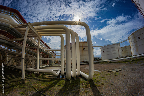 Steel long pipes and pipe elbow in station tank oil factory during refinery Petrochemistry industry