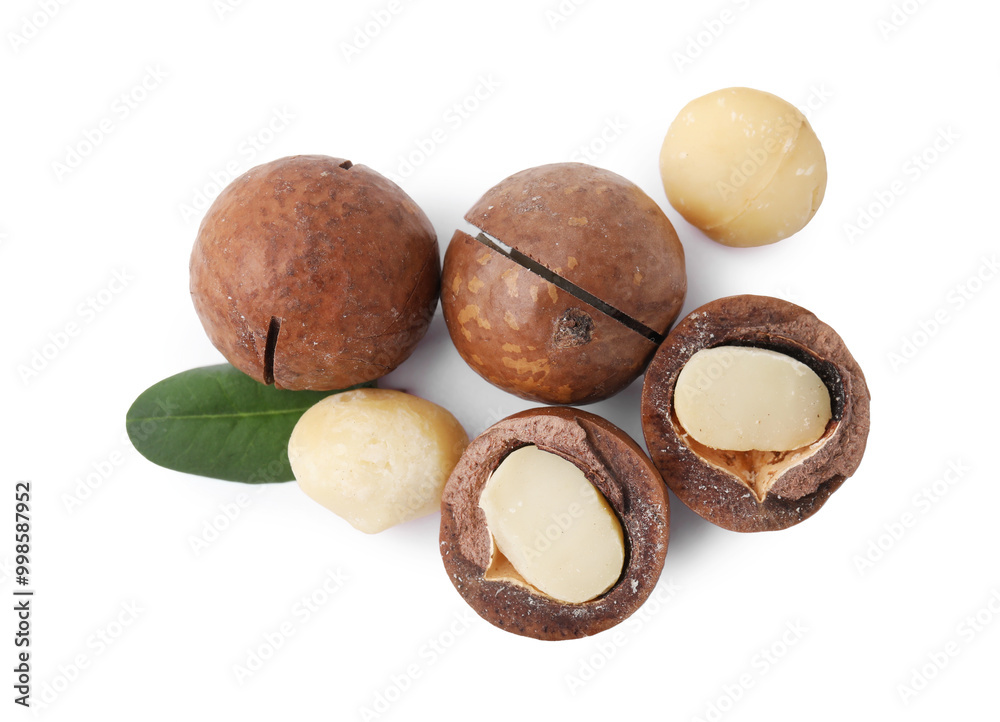 Macadamia nuts with shells isolated on white, top view Macadamia nuts with shells isolated on white, top view