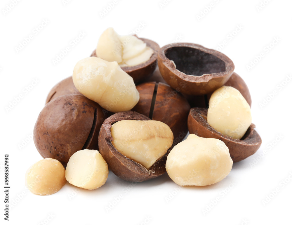 Macadamia nuts with shells isolated on white