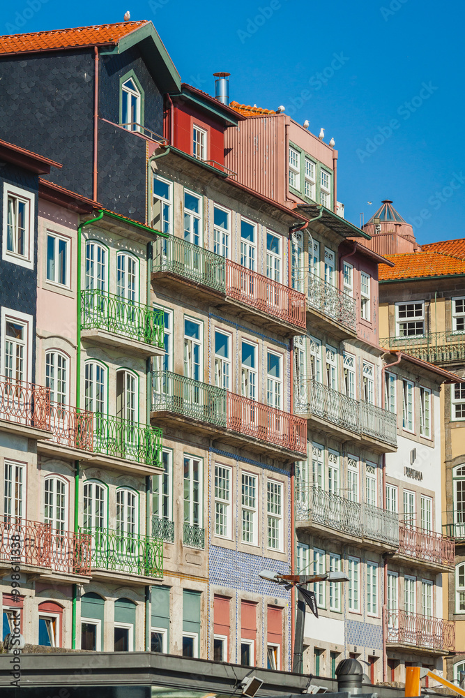 a vibrant row of traditional Portuguese buildings a vibrant row of traditional Portuguese buildings