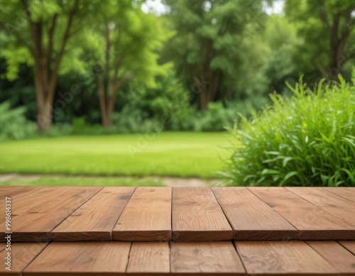 A wooden table with a natural finish sits in the foreground, while a lush, verdant garden with trees and grass is visible in the background