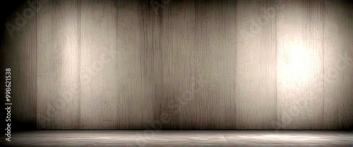 A dark, empty room with a wooden paneled wall and a concrete floor