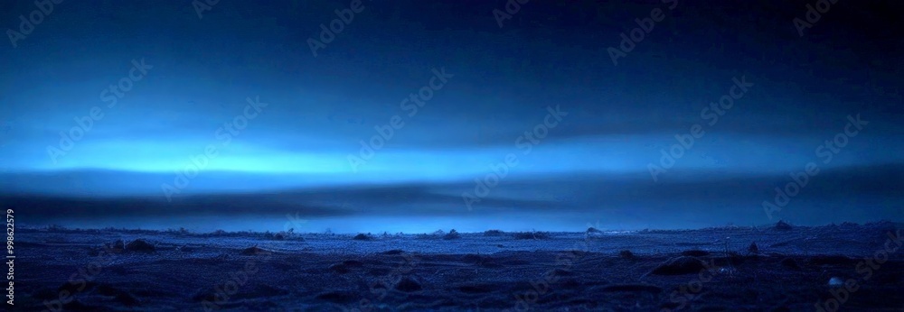 Fototapeta premium A dark, moody landscape with a hazy, cloudy sky in the background
