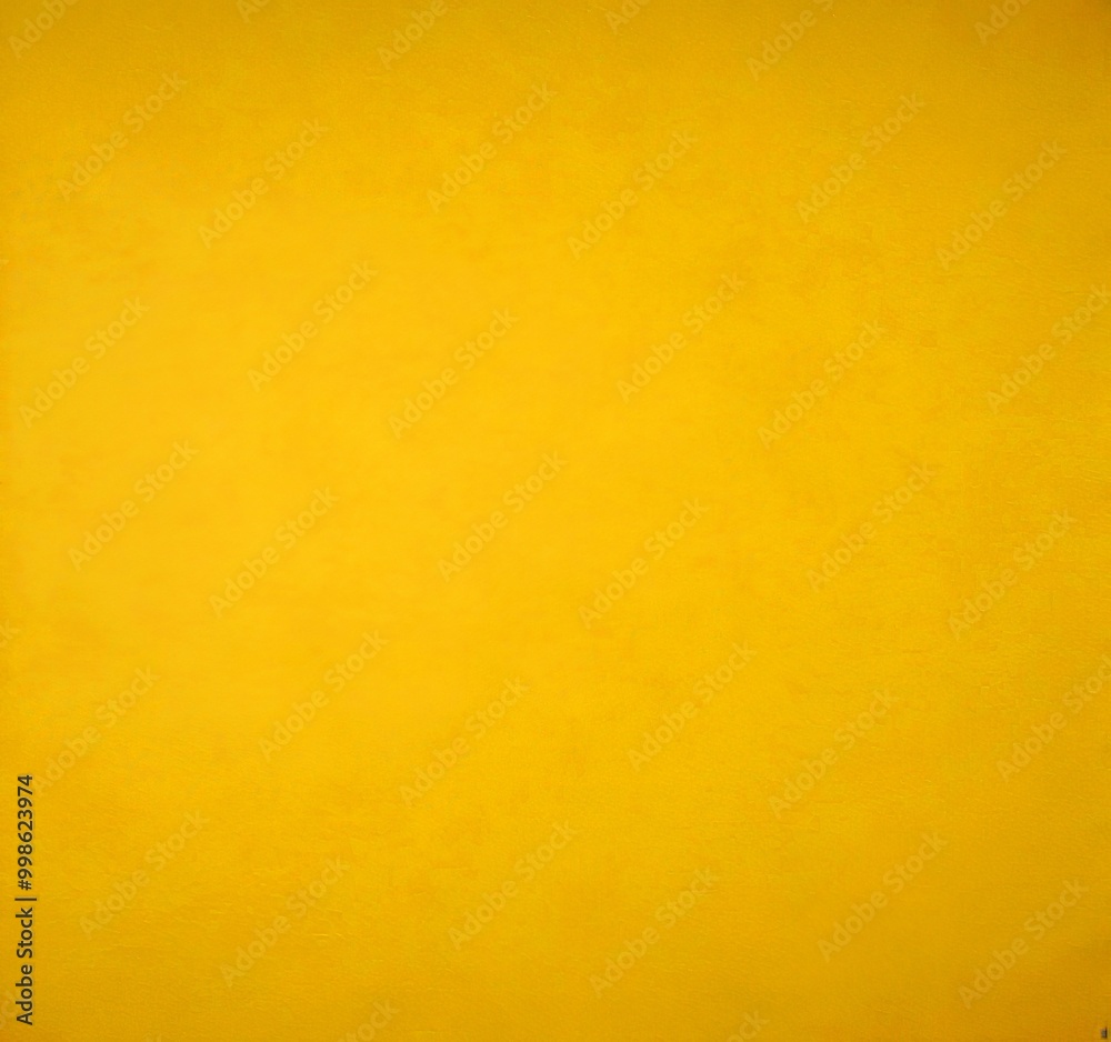 Obraz premium a simple, unadorned photograph yellow background, devoid of any discernible text or objects