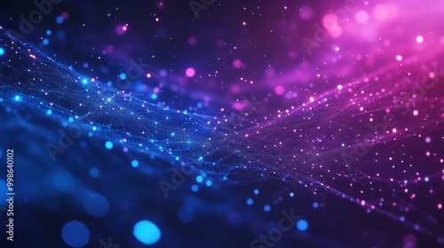 Abstract blue and pink glowing light bokeh background with blur.