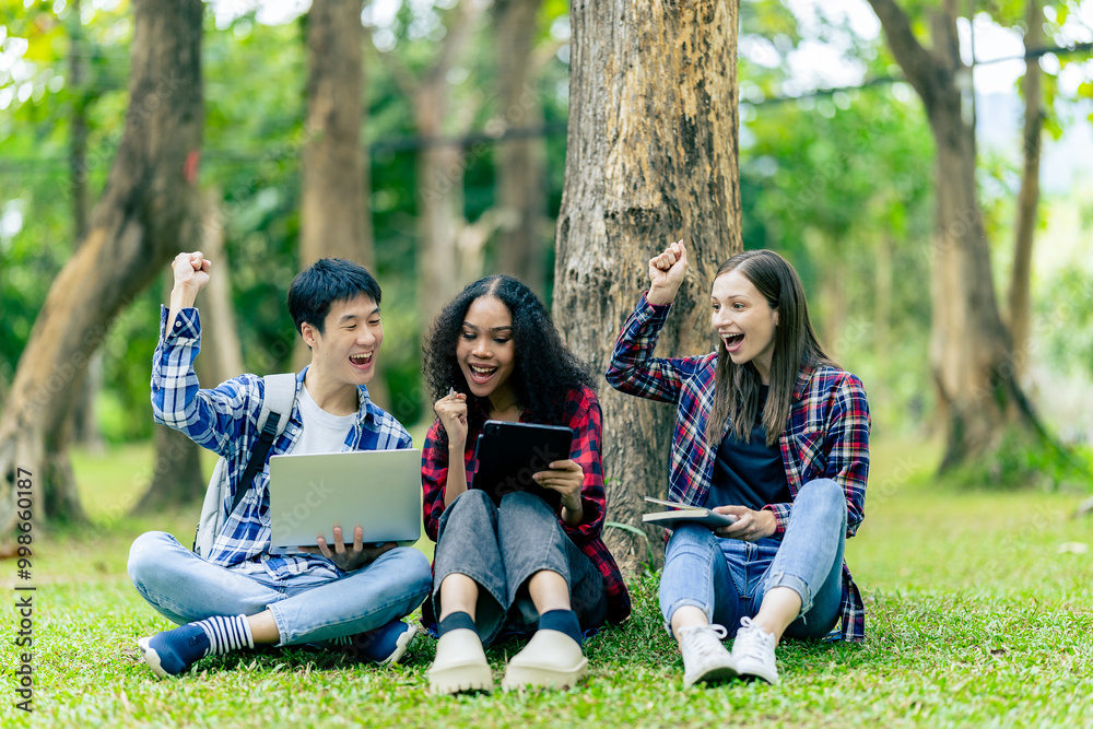 Group of Asian female college students talking and working together at university in a park discussing their studies together. Group of Asian female college students talking and working together at university in a park discussing their studies together.