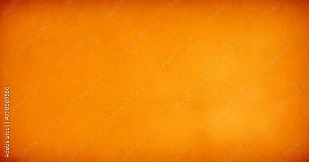 Fototapeta premium a textured orange background with a gradient effect, resembling a vintage or aged appearance