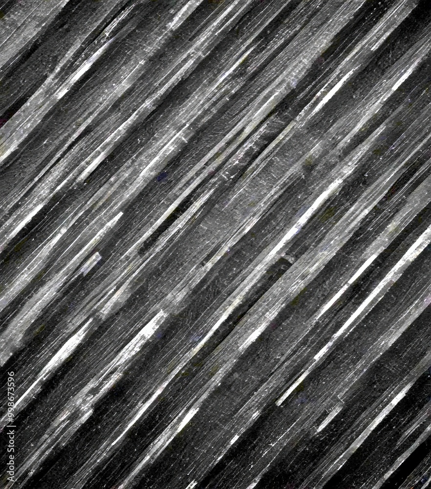 a diagonal pattern of dark, vertical lines that create a sense of movement and depth a diagonal pattern of dark, vertical lines that create a sense of movement and depth
