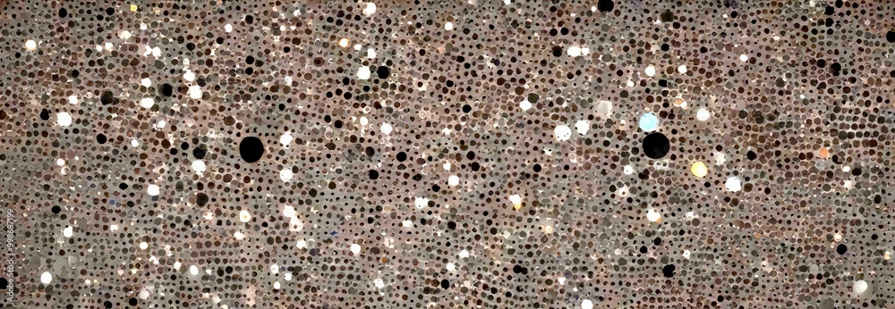 Fototapeta premium a close-up view textured surface with a pattern of small, irregularly shaped dots in various shades of gray, black, and white