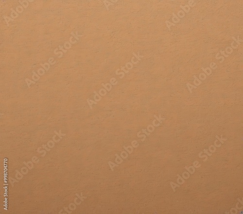 A simple, unadorned brown paper surface, with no discernible text or objects