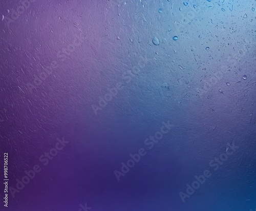 a gradient background transitioning from a deep purple at the top to a lighter blue at the bottom, with water droplets scattered throughout the frame