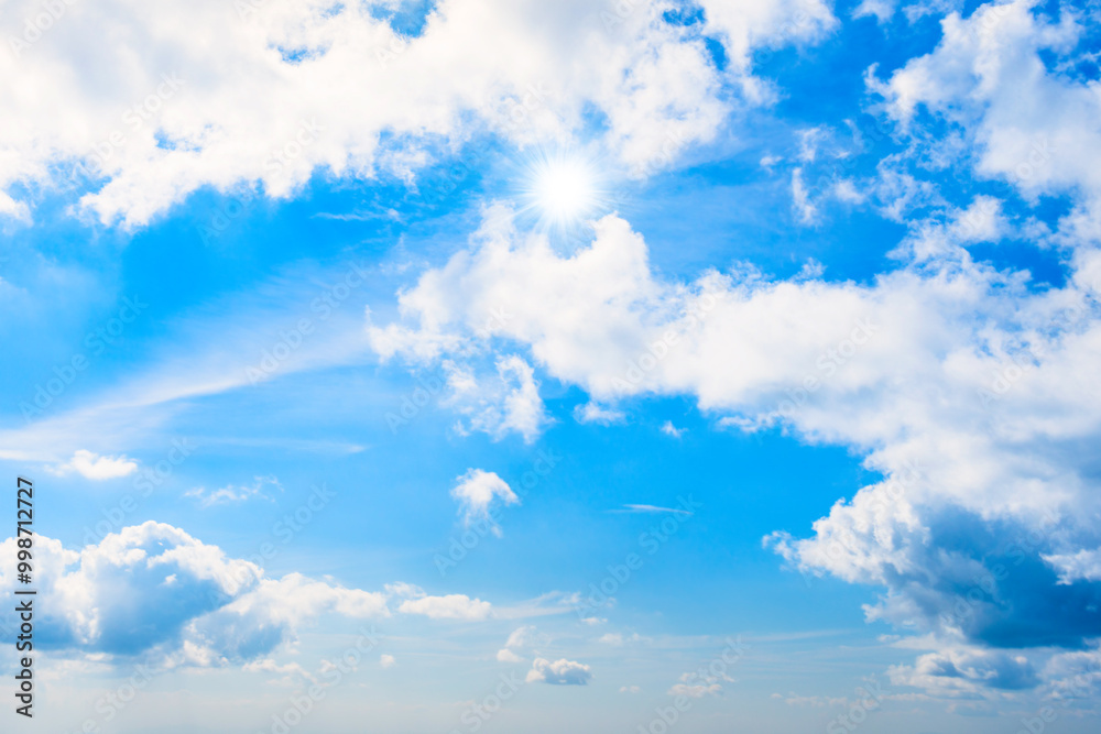 Blue sky and clouds with sun rays, sky background Blue sky and clouds with sun rays, sky background