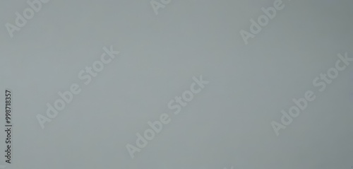 a gray, flat surface with no discernible objects or text photo