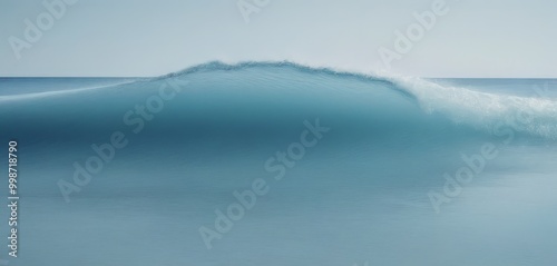 A serene large, curling wave in the ocean, captured in a long exposure setting, with a calm and tranquil atmosphere