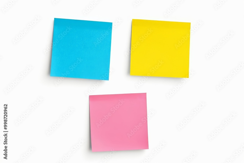 three post it notes are placed on a white surface three post it notes are placed on a white surface