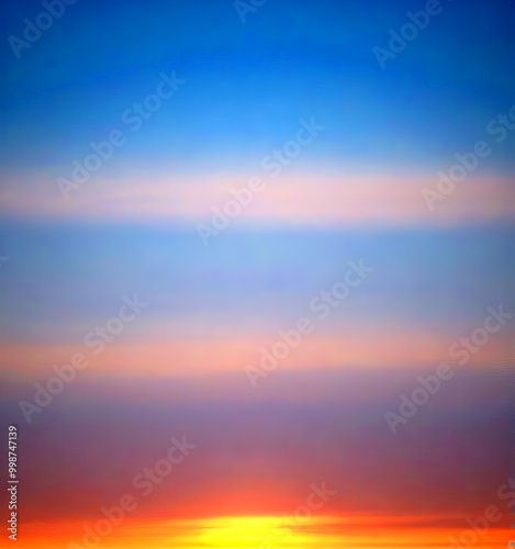 a gradient sky transitioning from deep blue to orange and pink hues, with wispy clouds and a faint outline of the horizon