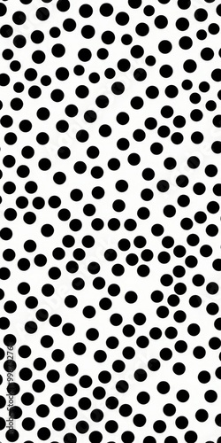 A repeating pattern of black dots on a white background