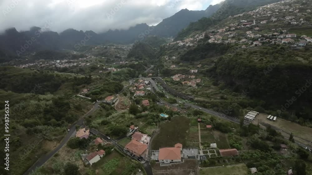 AERIAL View of Our Lady Of Fatima Chapel on Green Hill surrounding Mountains, Sao Vicente AERIAL View of Our Lady Of Fatima Chapel on Green Hill surrounding Mountains, Sao Vicente