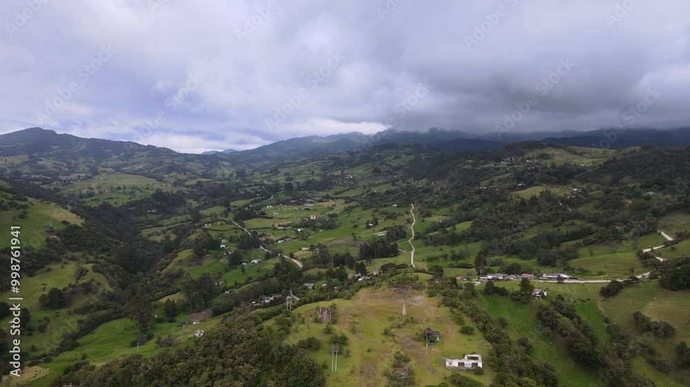 Aerial view of green mountains and cloudy sky, Colombia Aerial view of green mountains and cloudy sky, Colombia