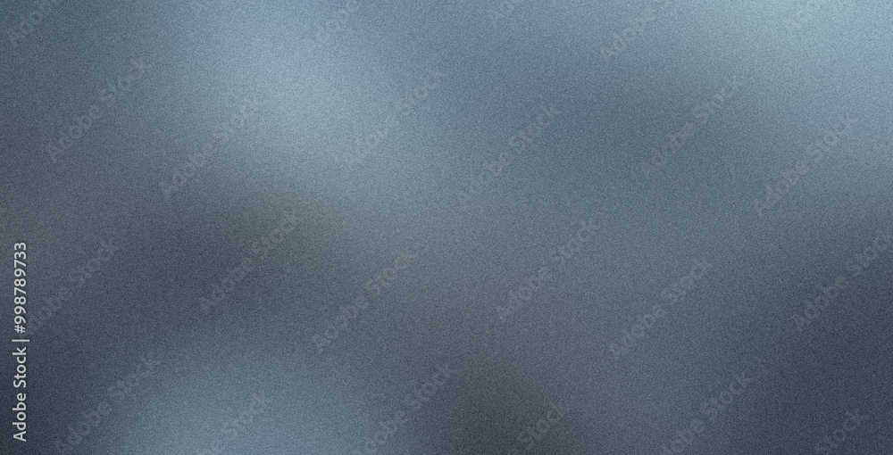 Grainy textured background with a dark blue color gradient creating a blurred effect Grainy textured background with a dark blue color gradient creating a blurred effect