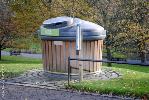 Close Up of Large Circular Litter Bin in Public Park