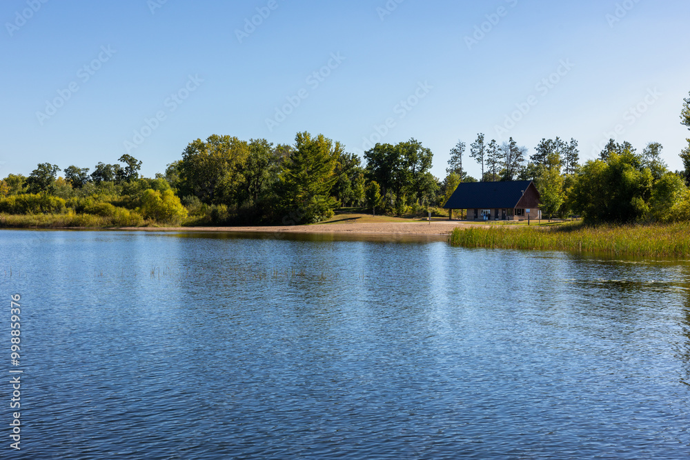 Fototapeta premium Public beach area on Big Marine Lake at Big Marine Park Reserve near Marine On St Croix Minnesota is a Washington County Park for recreation