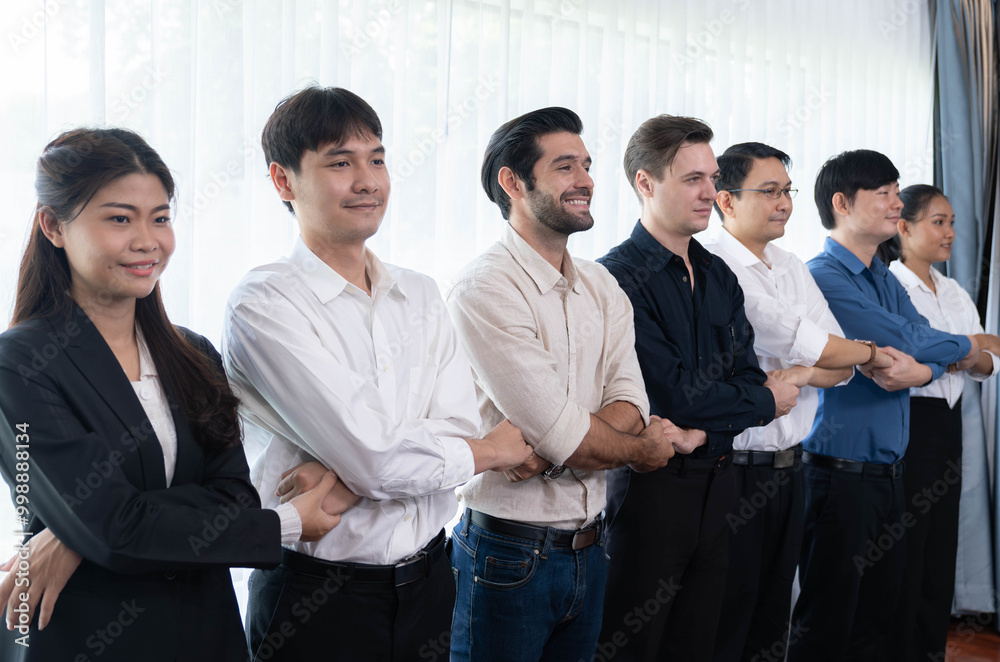 Business team standing, join and link hand together in line symbolize successful business partnership and professional synergy with diverse culture group people cooperation. Prudent Business team standing, join and link hand together in line symbolize successful business partnership and professional synergy with diverse culture group people cooperation. Prudent