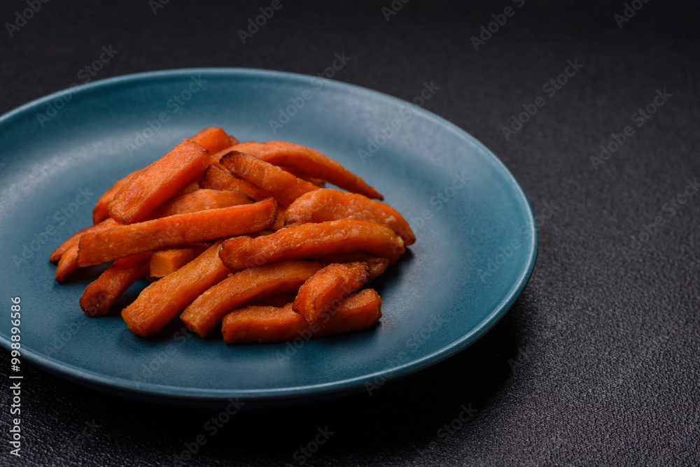 Delicious crispy sweet potato fries with salt, spices and herbs