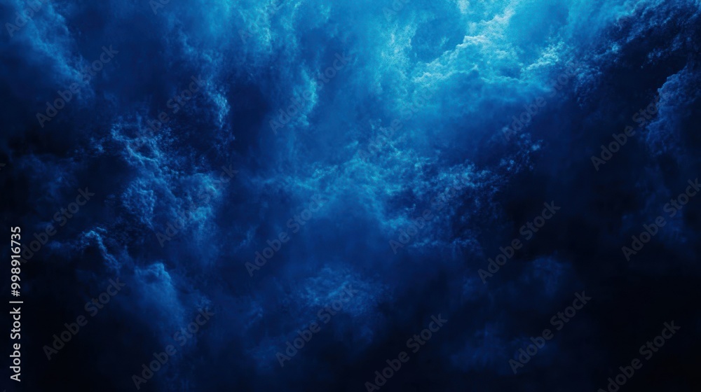 Fototapeta premium Dark Blue Clouds with Light Streaks in the Sky