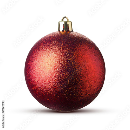 a red Christmas ornament ball with a pink background