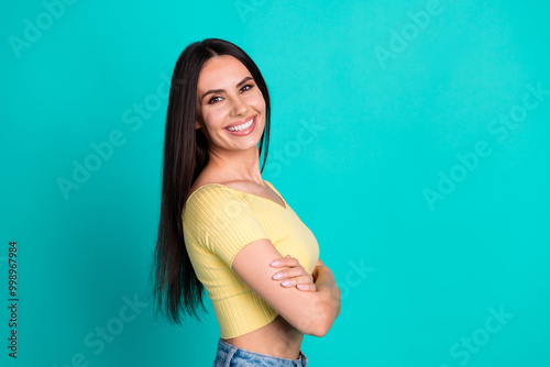 Profile photo of pretty young woman empty space wear top isolated on teal color background