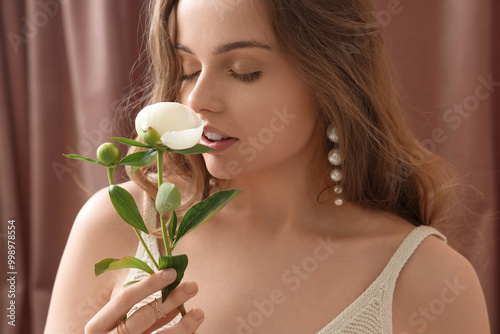 Beautiful young woman with ...