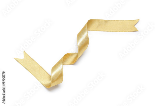 Golden satin ribbon isolated on white background photo