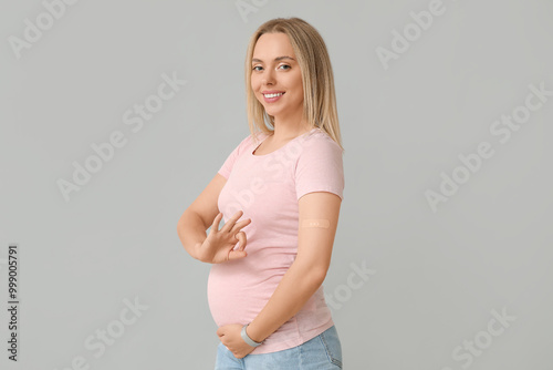 Young pregnant woman after ...