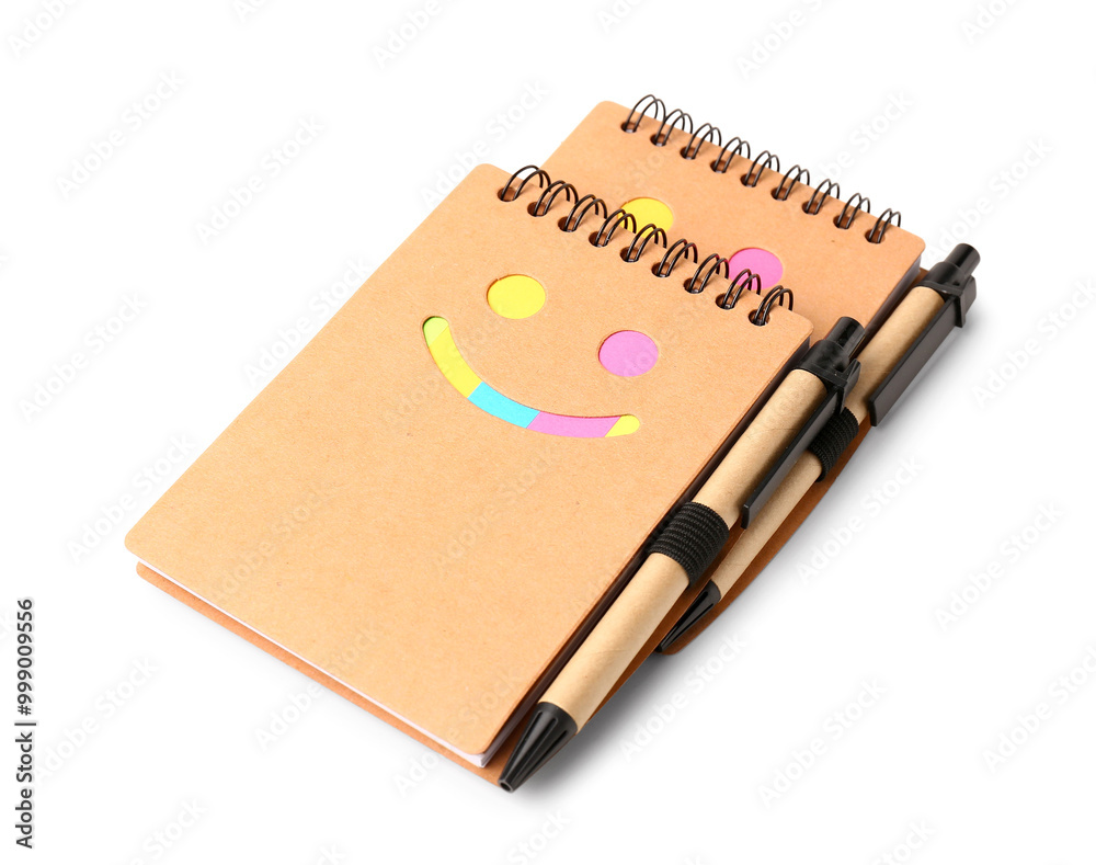 Stylish notebooks with pens on white background Stylish notebooks with pens on white background