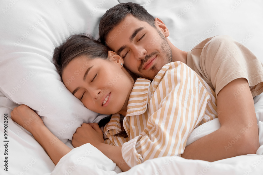 Lovely young couple sleeping in bed Lovely young couple sleeping in bed
