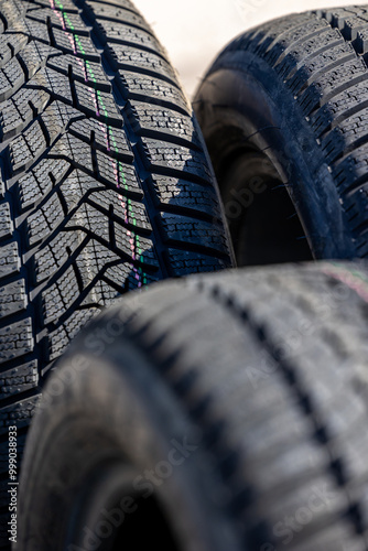 Sharp tread of new winter tires ready for the seasonal change. New tires are important for increasing road safety