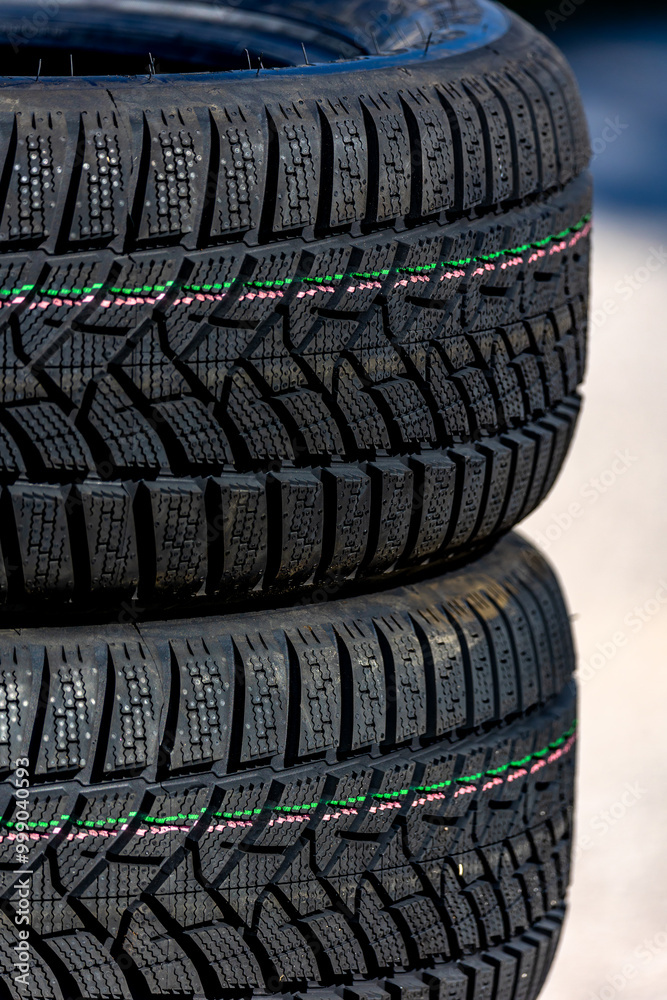 Sharp tread of new winter tires ready for the seasonal change. New tires are important for increasing road safety